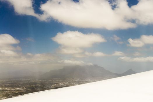 View from an airplane window at high altitude and turbines about Africa.