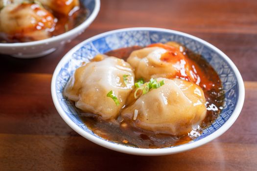 Bawan (Ba wan), Taiwanese meatball delicacy, delicious street food, steamed starch wrapped round shaped dumpling with pork inside, close up, copy space