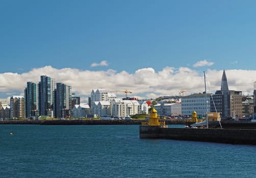 Reykjavik city center - view on a port and water front on a sunny day, Iceland