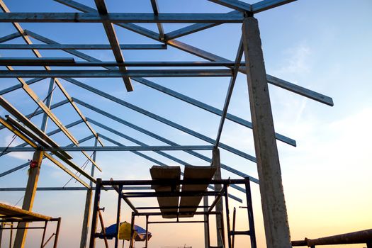 New home construction site Steel roof mortar scaffolding on countryside nature