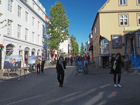 Iceland, Reykjavik, August 3, 2016: Main street in Reykjavik city center in sunny day peoples walking shopping and having fun