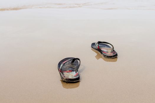 Take off the shoes to swimming sea in the relax holiday