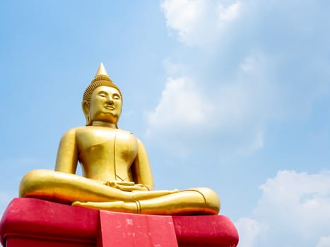 PATHUM THANI, THAILAND - May 2 : 2020. Beautiful big buddha "Luang Phor Sothorn" on blue sky background at Wat Bot Temple at Pathum Thani, THAILAND with copy space.