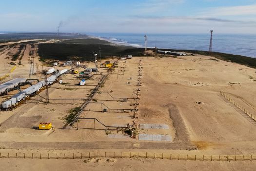 Oil wells in an oil field. Oil well group.