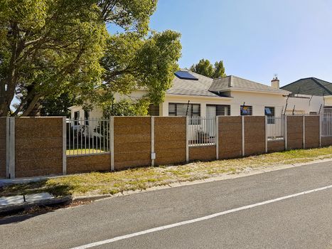 Street in the town of Claremont, Cape Town, South Africa. Sunny weather in the summer