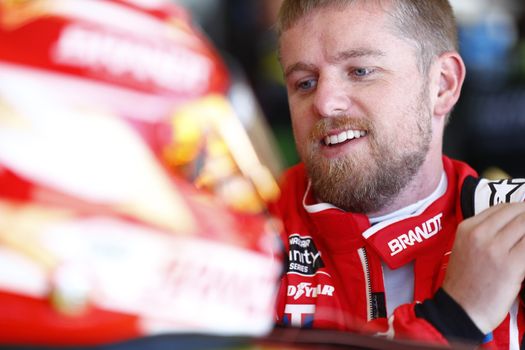 Justin Allgaier (7) gets ready to practice for the LS Tractor 200 at Phoenix Raceway in Avondale, Arizona.