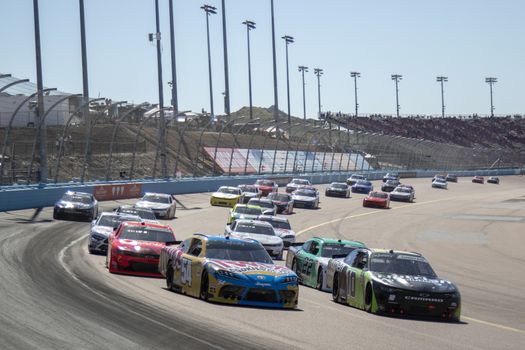 Ross Chastain (10) races for position for the LS Tractor 200 at Phoenix Raceway in Avondale, Arizona.