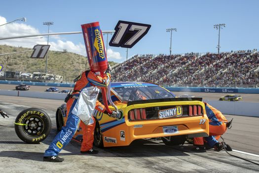 Chris Buescher (17) and crew make a pit stop for the FanShield 500 at Phoenix Raceway in Avondale, Arizona.