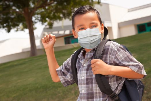 Hispanic Student Boy Wearing Face Mask with Backpack on School Campus.