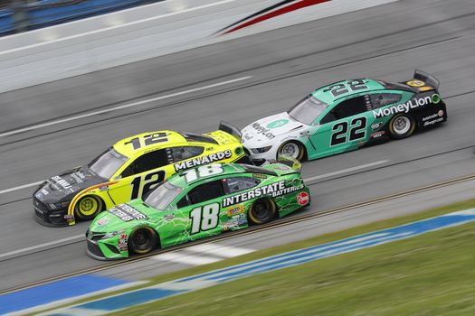 Kyle Busch (18) races down the dogleg during the GEICO 500 at Talladega Superspeedway in Lincoln, Alabama.