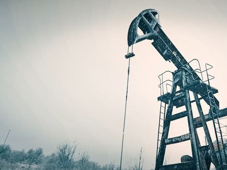 A rocking machine on an oil well. Oil production.