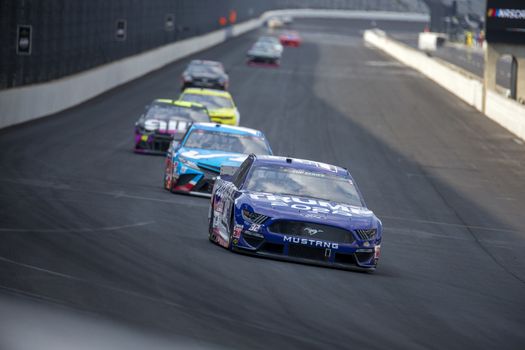 Corey LaJoie (32) races for position for the Big Machine Hand Sanitizer 400 Powered by Big Machine Records at Indianapolis Motor Speedway in Indianapolis, .
