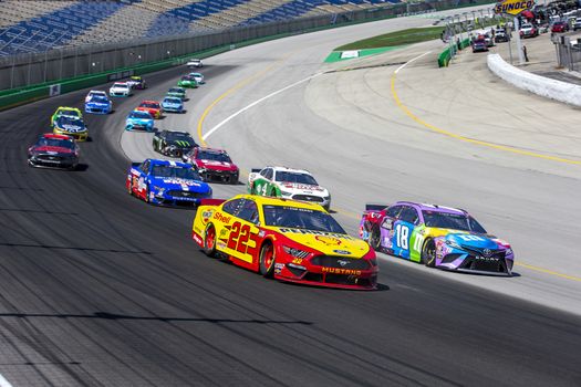 Joey Logano (22) races for the Quaker State 400 Presented by Walmart at Kentucky Speedway in Sparta, Kentucky.