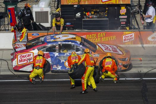 Ryan Newman (6) and crew make a pit stop for the Big Machine Hand Sanitizer 400 Powered by Big Machine Records at Indianapolis Motor Speedway in Indianapolis, .