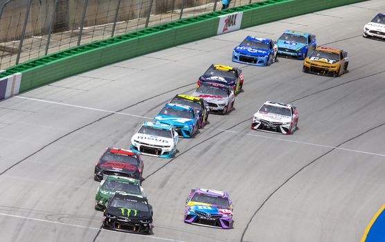 Kurt Busch (1) races for the Quaker State 400 Presented by Walmart at Kentucky Speedway in Sparta, Kentucky.