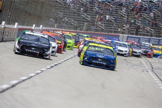 Ryan Blaney (12) races for position the O'Reilly Auto Parts 500 at Texas Motor Speedway in Fort Worth, Texas.