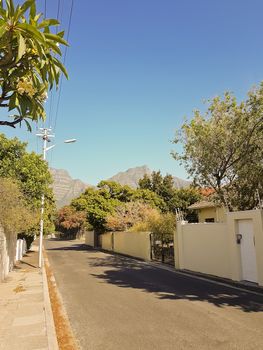 Street in Claremont, Cape Town, South Africa. Blue sky and sunny weather.