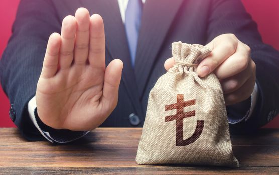 Businessman refuses to give turkish lira money bag. Asset freeze. Stop financing projects and reforms, crisis financial difficulties. Loan refusal, bad credit history. Payment refund. Deception