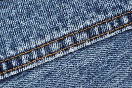 A denim jeans seam double stitch close up blue