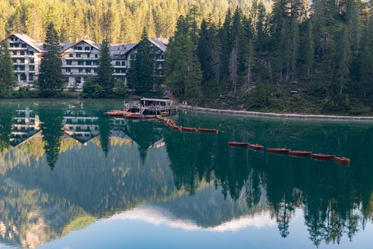 Mountain landscape with reflections on the Braies lake in Val Pusteria, South Tyrol Dolomites