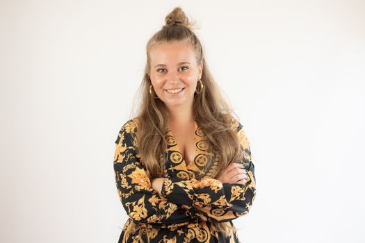 Portrait of a pretty blonde young girl smiling