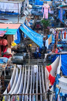 View of Dhobi Ghat (Mahalaxmi Dhobi Ghat) is world largest open air laundromat (lavoir) in Mumbai, India with laundry drying on ropes. Now one of signature landmarks and tourist attractions of Mumbai