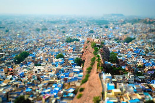 Aerial view of Jodhpur, also known as Blue City due to the vivid blue-painted Brahmin houses around Mehrangarh Fort. Jodphur, Rajasthan. Tilt shift miniature toy camera effect