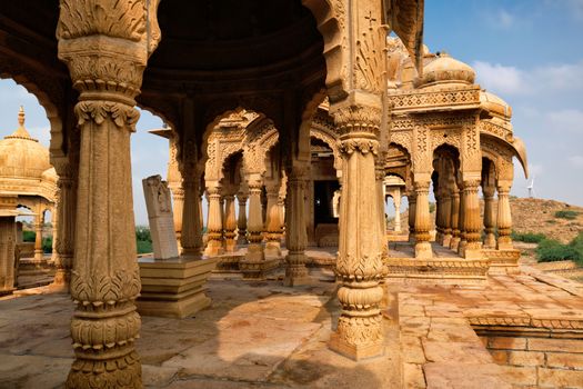 Tourist attraction and Rajasthan landmark - Bada Bagh cenotaphs (Hindu tomb mausoleum) made of sandstone in Indian Thar desert. Jaisalmer, Rajasthan, India