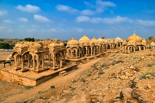 Tourist attraction and Rajasthan landmark - Bada Bagh cenotaphs (Hindu tomb mausoleum) made of sandstone in Indian Thar desert. Jaisalmer, Rajasthan, India