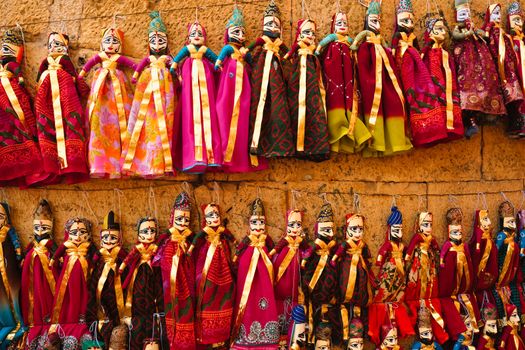 Colorful handmade traditional Rajasthani puppets for sale in Jaisalmer, Rajasthan, India.