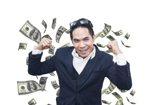 Portrait of a happy Asian business man on money flying background