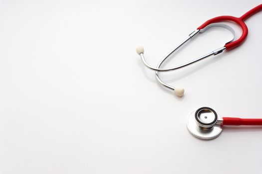 Stethoscope on white background. Healthcare dan Copy Space concept