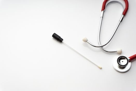 Medical swab and stethoscope on white background. Healthcare dan Copy Space concept