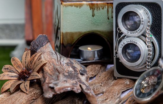 Vintage two lens photo camera on wooden background. An idea of old camera and memory, time Nostalgia.