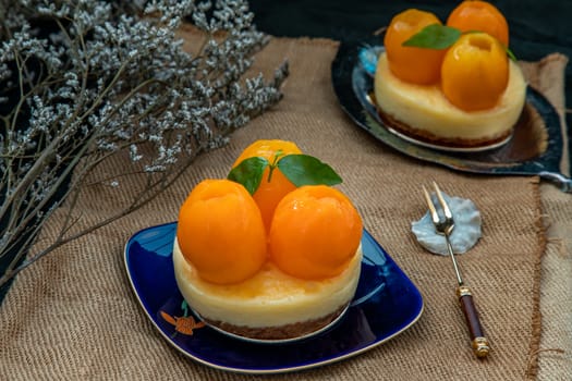 Traditional French sweet dessert : Mayomgchid tart on beautiful background. One piece, Delicious seasonal breakfast. Oblique view from the top, Selective focus.