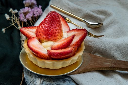 Traditional French sweet dessert : Strawberry tart on beautiful background. One piece, Delicious seasonal breakfast.  Selective focus.