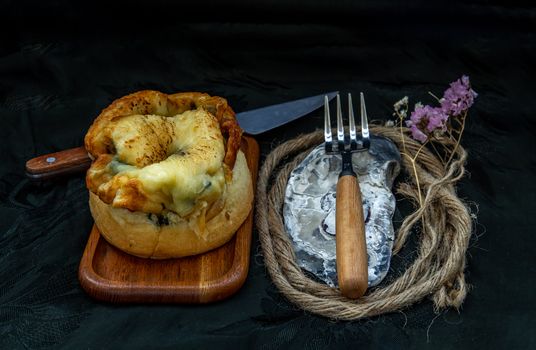 Traditional French sweet dessert : Spinach Brioche on the wooden tray. One piece, Delicious seasonal breakfast. Oblique view from the top, Selective focus.