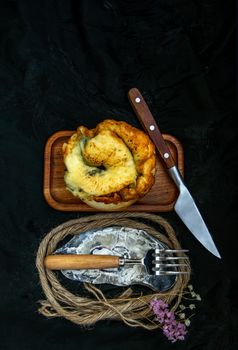 Traditional French sweet dessert : Spinach Brioche on the wooden tray. One piece, Delicious seasonal breakfast. Top view, Selective focus.