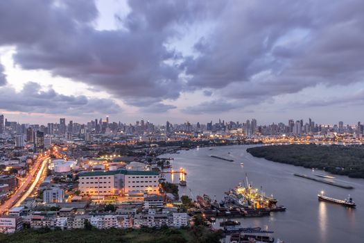 Bangkok, thailand - May 20, 2020 : Beautiful view of Bangkok city, Beauty skyscrapers along Chaopraya river in the evening, making the city modern style. Selective focus.