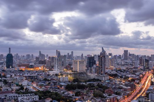 Bangkok, thailand - May 20, 2020 : Sky view of Bangkok with skyscrapers in the business district in Bangkok in the evening beautiful twilight give the city a modern style. Selective focus.