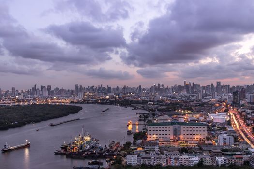 Bangkok, thailand - May 20, 2020 : Beautiful view of Bangkok city, Beauty skyscrapers along Chaopraya river in the evening, making the city modern style. Selective focus.