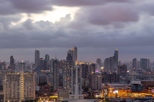 Bangkok, thailand - May 20, 2020 : Sky view of Bangkok with skyscrapers in the business district in Bangkok in the evening beautiful twilight give the city a modern style. Selective focus.