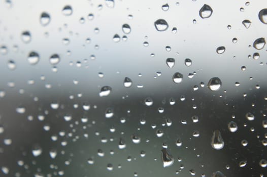 Drops of rain on the window, shallow dof.