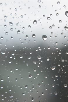 Drops of rain on the window, shallow dof.