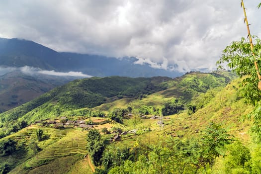 Green rice terraces at highlands Sa Pa village in the mountains of Sapa of North Vietnam