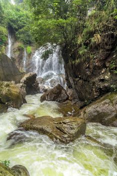 Waterfall in the rainforest jungle Sapa Valley in Lao Cai Province in Vietnam
