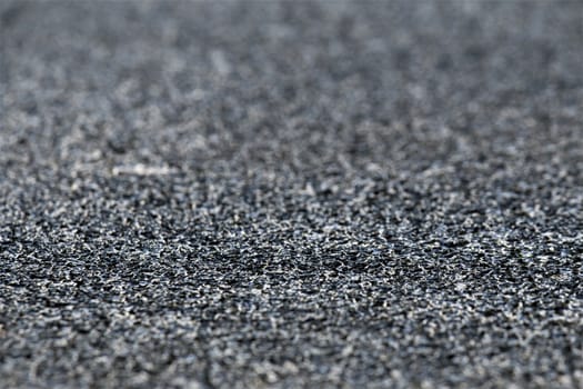 Close up of black asphalt after rain