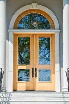 A perfect neighbourhood. Entrance of luxury family house with doorsteps in front