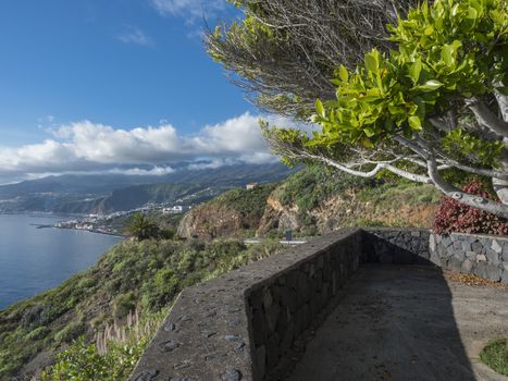 La Palma, Canary Islands, view from viewpoint Mirador de San Juanito with view on Santra Cruz de la Palma and ocean. Blue sky background.