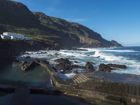 Natural sea swimming pool at la Fajana with waves of atlantic ocean, La Palma, Canary Islands, Spain.
